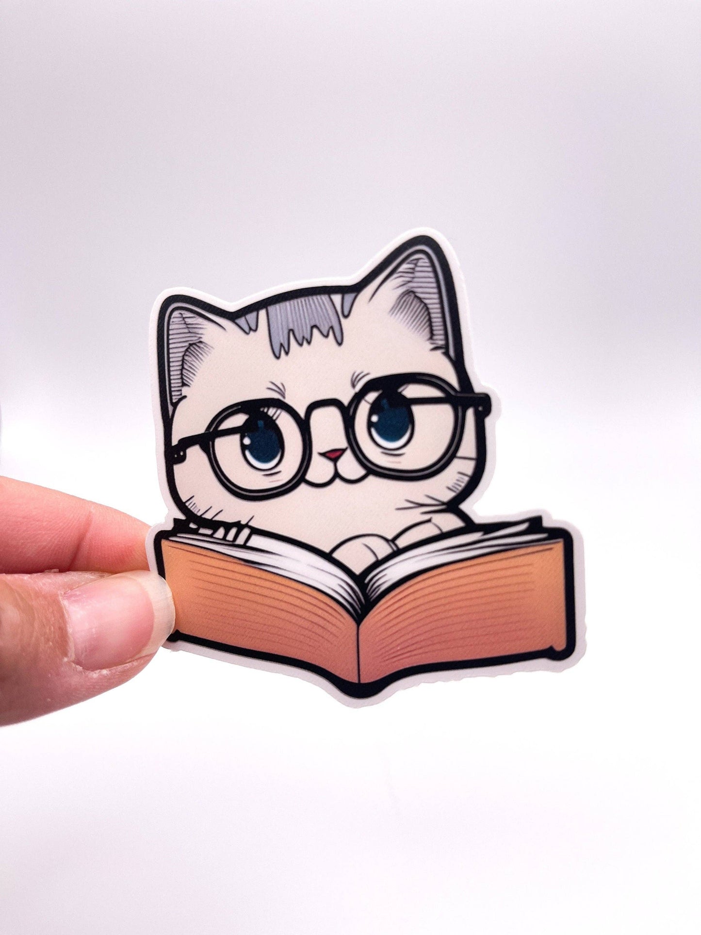 Gray Cat Reading a Book Sticker by Big Chair Dreams