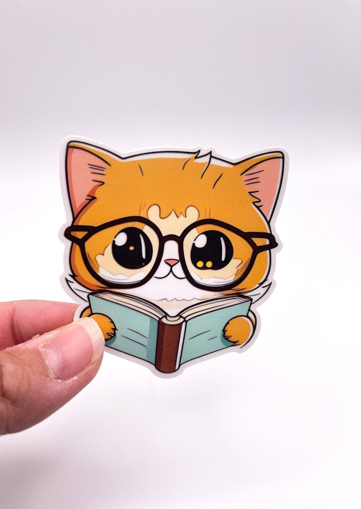 Orange Cat Reading a Book Sticker by Big Chair Dreams